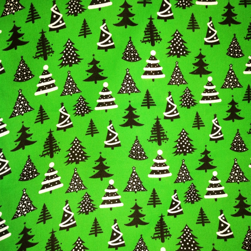 Christmas Polycotton - Black and White Cristmas Trees on Green